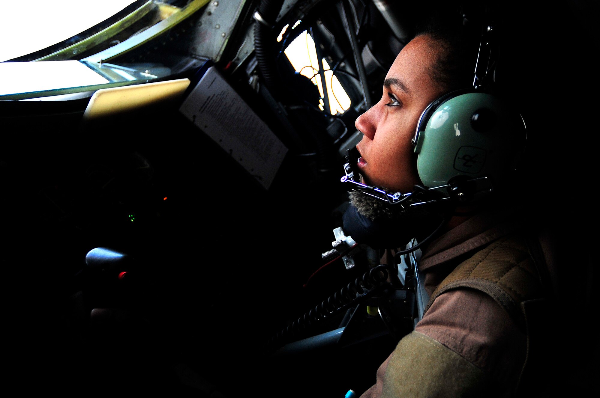 Airman 1st Class Roslyn Longmire, 340th Expeditionary Air Refueling Squadron boom operator, refuels a Navy EA-18G Growler over Iraq on Nov. 5, 2011. KC-135 Stratotankers provided approximately 200,000 pounds of fuel each day to aerial assets in Iraq. (U.S. Air Force photo/Master Sgt. Cecilio Ricardo)
