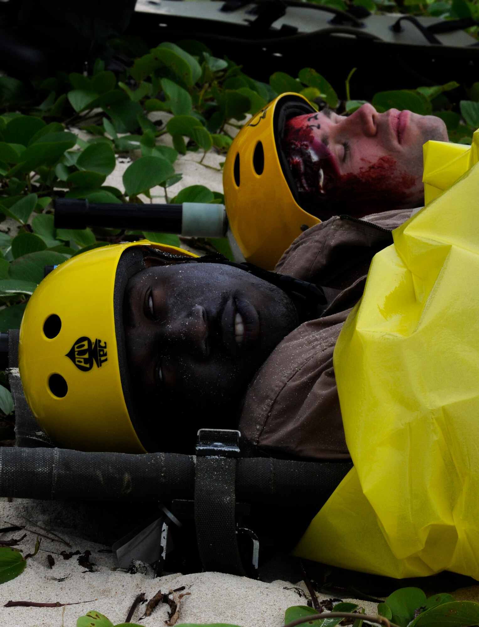Simulated victims during Cope Angel 12, a bilateral exercise in Okinawa, Japan, pretend to be deceased to add more realism to the exercise Dec. 5, 2011. Roughly 50 individuals from the 18th Wing and JASDF volunteered to participate as simulated victims the first day of Cope Angel 12. (U.S. Air Force photo by Airman 1st Class Maeson L. Elleman/Released)