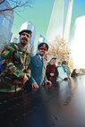 NEW YORK -- Afghanistan Army Major General Sayed Malouk, 215 Corps commander, (left) and Afghanistan National Police Major General Mullah Khil, 707 AUP Regional Headquarters deputy commander, view the National September 11 Memorial, Dec. 9. Five high-ranking officers of the Afghan National Army and Police have have been touring the U.S. for a week, with stops in San Diego, Washington and New York to learn more about U.S. approaches to counter-terrorism, counter-insurgency and border security, including a visit earlier in the day to the FBI's Joint Terrorism Task Force. The trip is designed to provide more knowledge to these top Afghanistan commanders to further develop Afghanistan's ability to independently secure their country as U.S. forces draw down. Khill spoke through an interpreter at the ceremony, expressing condolences for the attacks on Sept. 11 and the resolve of the Afghanistan people to create a more stable country in the face of terrorism. (Official Marine Corps photo by Cpl. Caleb Gomez / RELEASED)