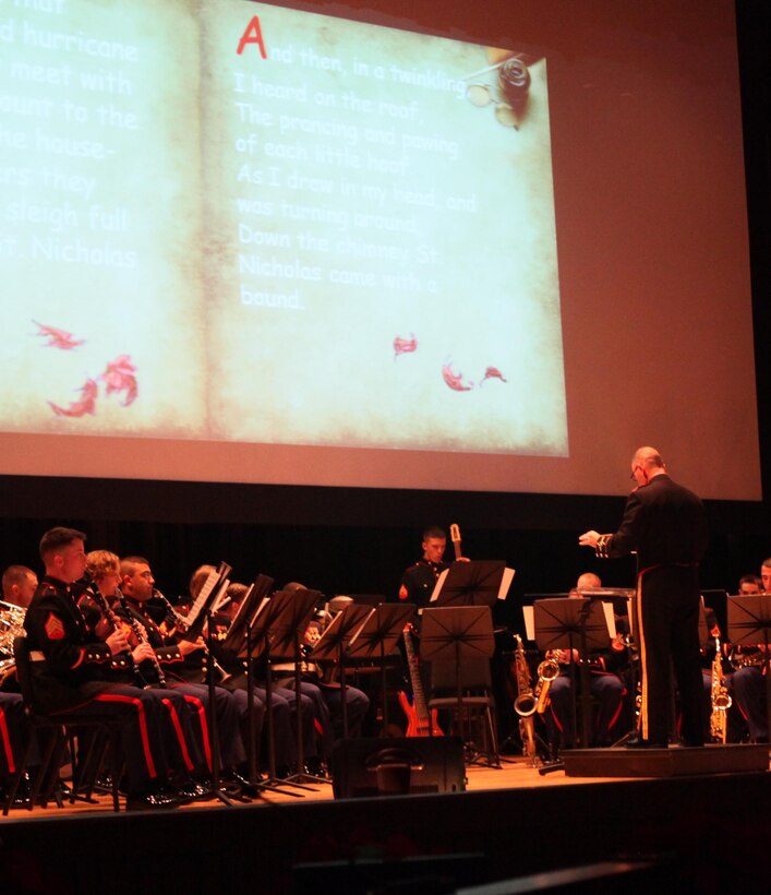 Marines from the 2nd Marine Division Band perform for more than 100 service members and their families during their presentation of “Wishing you a Season of Joy and Peace” at the Base Theater aboard Marine Corps Base Camp Lejeune, Saturday.