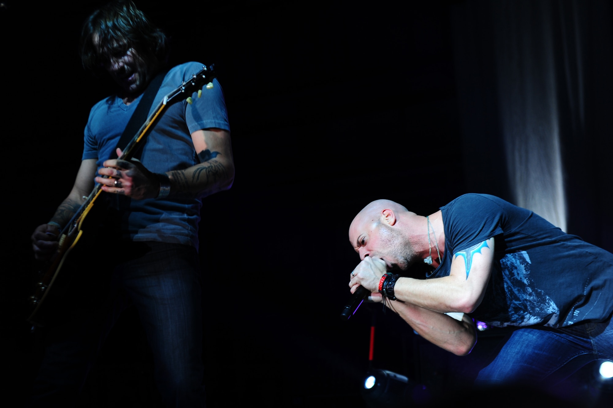 The rock band Daughtry performs during a concert for service members at Ramstein Air Base, Germany, Dec. 10, 2011. The performers are on a 13-day tour playing six concerts that will take them through Southwest Asia and Europe to bring entertainment to American troops and their families as part of the Operation Seasons Greetings - Tour for the Troops 2011. (U.S. Air Force photo by Airman Brea Miller)