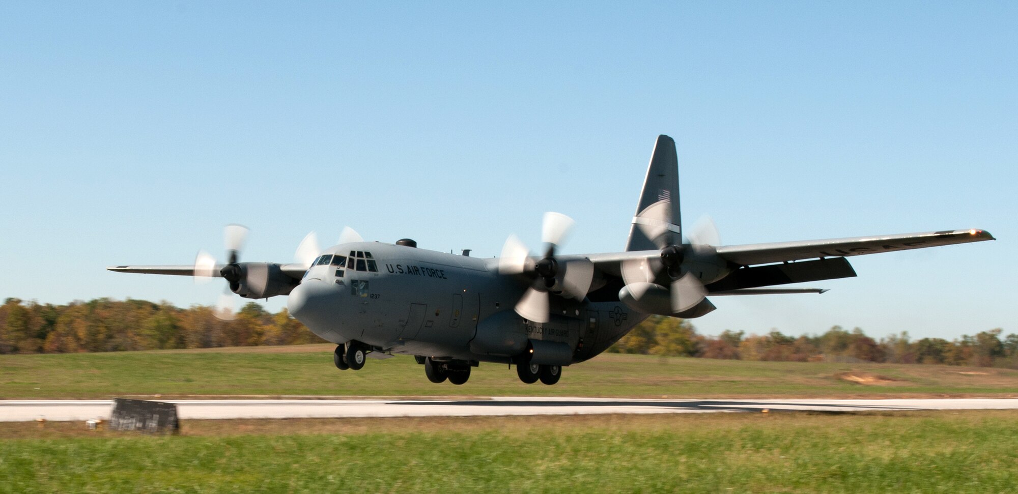 A Kentucky Air National Guard C-130 touches down at Fort Knox, Ky., during the 165th Airlift Squadron's first-annual Air Derby, held Oct. 22, 2011. The contest scored aircrews in multiple areas, including threat and airspace avoidance, airdrop accuracy and assault landing accuracy. (U.S. Air Force photo by Master Sgt. Phil Speck)