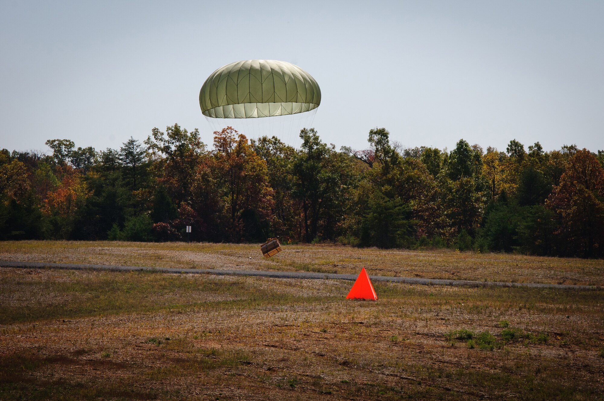 Cargo deployed from a Kentucky Air Guard C-130 Hercules lands within feet of its intended target during precision airdrops conducted Oct. 22, 2011, at Fort Knox, Ky., as part of the 165th Airlift Squadron's first-ever Air Derby. The contest scored crews in multiple areas, including threat and airspace avoidance, airdrop accuracy and assault landing accuracy. (U.S. Air Force photo by Senior Airman Maxwell Rechel)