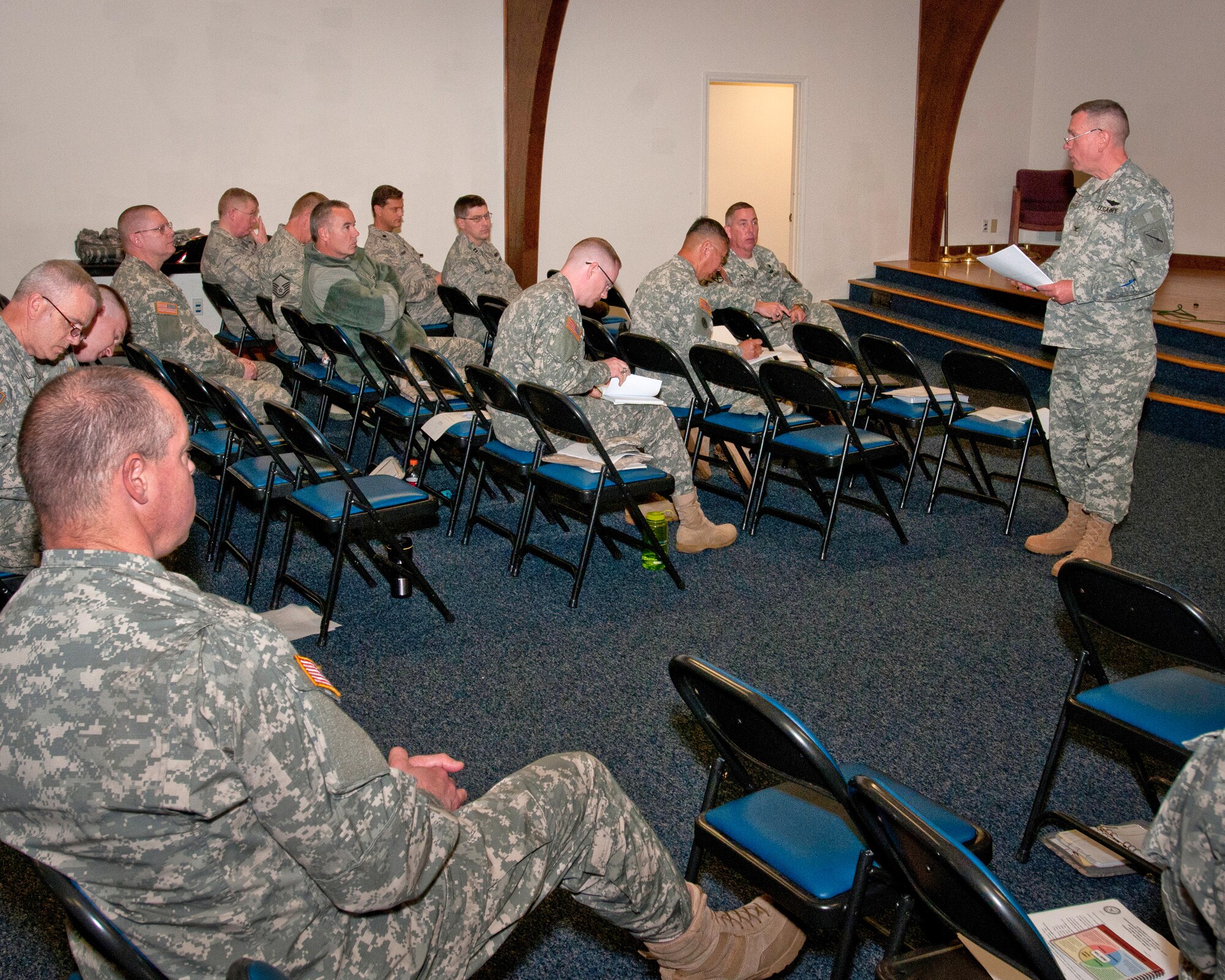 Chaplain (Col.) David Graetz, Kentucky Joint Forces Headquarters chaplain, answers questions from fellow chaplains, chaplain candidates, and assistants during the annual Joint Chaplaincy Corps Training Conference held at the Kentucky Air National Guard Base on Oct. 15. The corps uses the conference to prepare for upcoming events, new programs and policy changes such as the recent repeal of Don't Ask, Don't Tell.  (U.S. Air Force photo by Tech Sgt. Jason Ketterer)