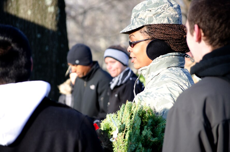 ARLINGTON, Va. -- 459th Air Refueling Airmen and their families joined over 10,000 servicemembers and civilian volunteers for the annual wreath laying at Arlington National Cemetery Dec. 10. 459 ARW Airmen took part in almost every aspect of the event, including transporting thousands of wreaths in trucks, greeting volunteers at the front gates and providing security. An estimated 85,000 wreaths were placed on the gravestones of fallen servicemembers and their loved ones. (Submitted photo/Michael D. Donahue)