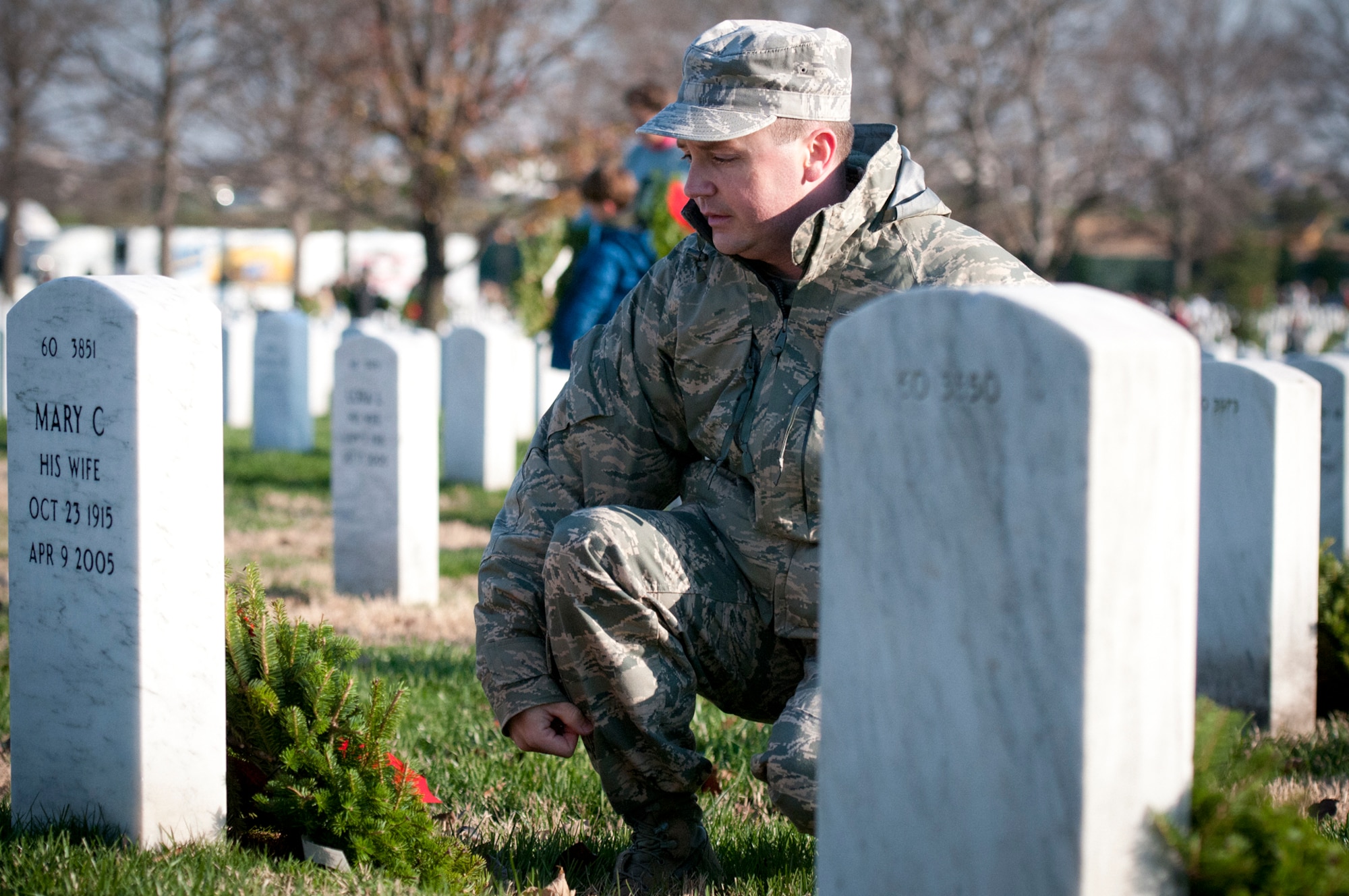 ARLINGTON, Va. -- 459th Air Refueling Airmen and their families joined over 10,000 servicemembers and civilian volunteers for the annual wreath laying at Arlington National Cemetery Dec. 10. 459 ARW Airmen took part in almost every aspect of the event, including transporting thousands of wreaths in trucks, greeting volunteers at the front gates and providing security. An estimated 85,000 wreaths were placed on the gravestones of fallen servicemembers and their loved ones. (U.S. Air Force photo/Tech. Sgt. Steve Lewis)