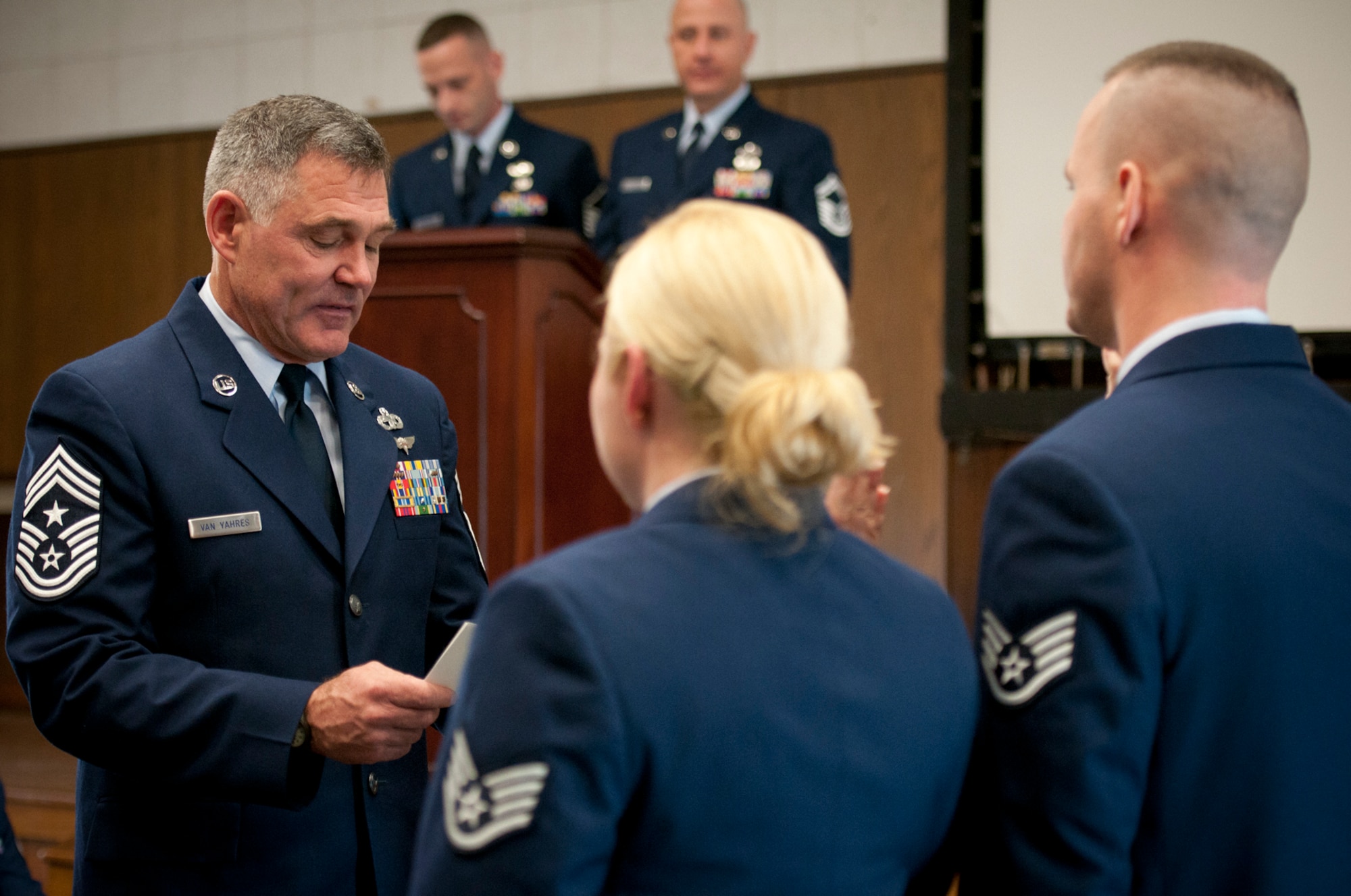 JOINT BASE ANDREWS, Md. -- 459th Air Refueling Wing Command Chief Clifford Van Yahres inducts 459th ARW Airmen into the noncommissioned officer ranks during a ceremony here Dec. 4, 2011. (U.S. Air Force photo/Tech. Sgt. Steve Lewis)