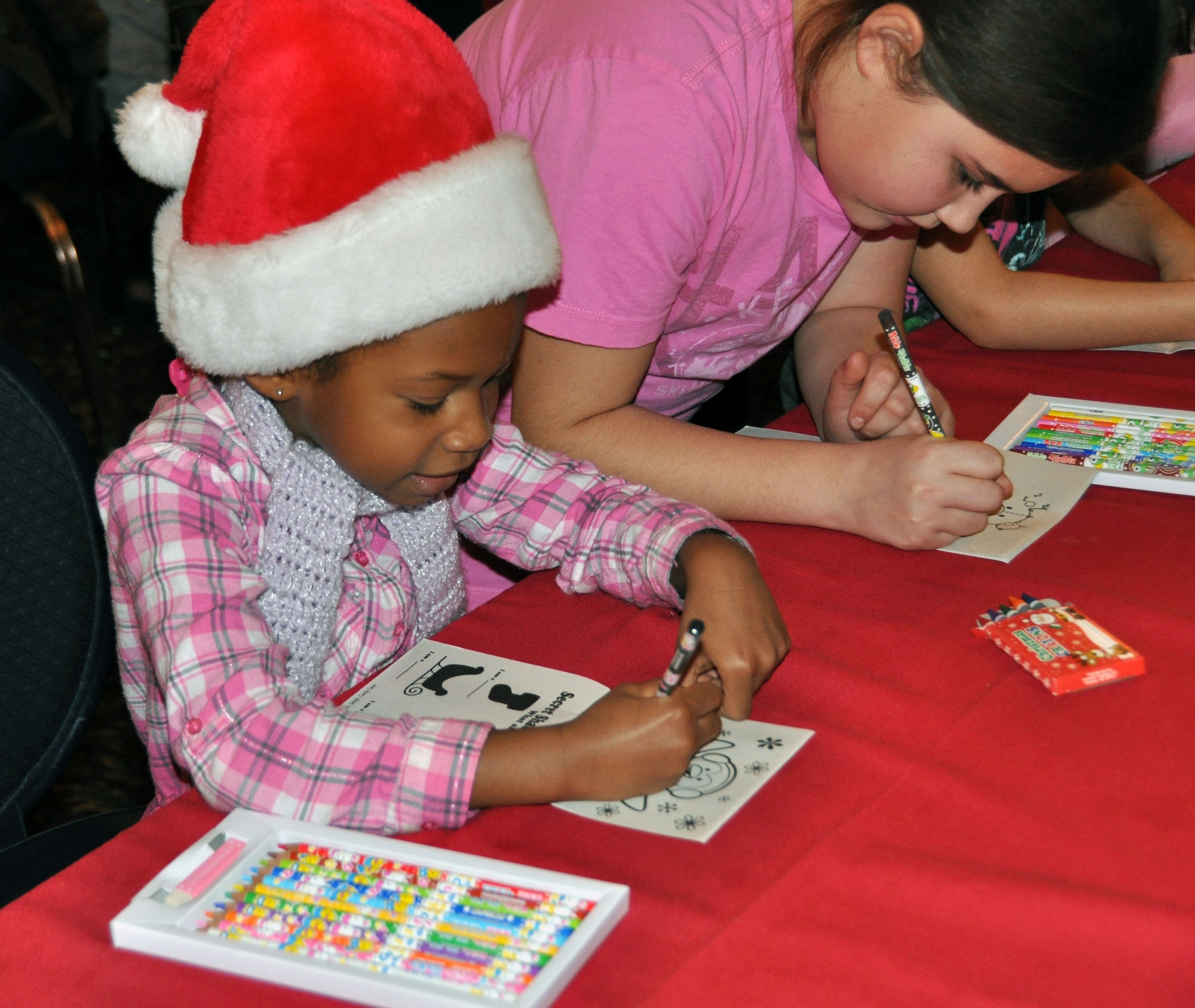 Children from Team Osan participated in a variety of arts and crafts, as well as had an opportunity to visit with Santa Claus during Winterfest Dec. 10, 2011. Winterfest is a base-wide event that brings all of Osan together to celebrate the holidays with food, fun and entertainment. (U.S. Air Force photo/Airman 1st Class Michael Battles)