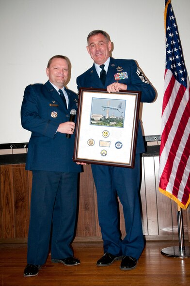 JOINT BASE ANDREWS, Md. -- The 459th Air Refueling Wing held a retirement ceremony for Command Chief Master Sgt. Clifford Van Yahres during the Unit Training Assembly here Dec. 3, 2011. Chief Van Yahres retired from the Air Force Reserve after 33 years of military service. His retirement ceremony was presided over by Col. (Ret.) Giordano McMullen, former commander of the 514th Airlift Mobility Wing, Joint Base McGuire-Dix-Lakehurst, N.J.. Chief Van Yahres served as command chief of the 913th Airlift Wing, Willow Grove Air Reserve Station, Pa., while Colonel McMullen was a commander there. (U.S. Air Force photo/Senior Airman Amber Russell)