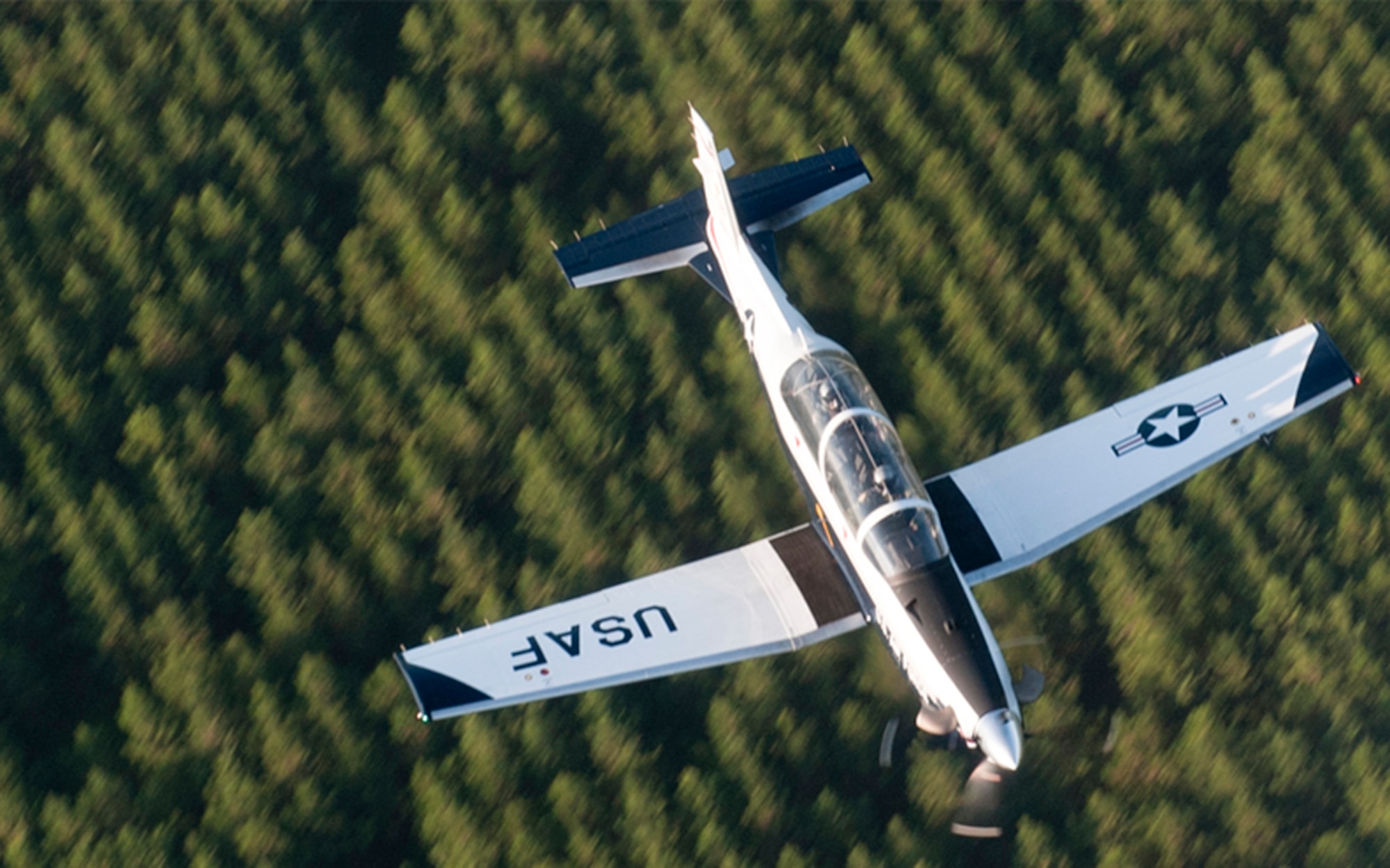 “THREE-LEGGED RACE”: When the flight controls malfunctioned on their T-6 Texan II, an instructor pilot and his student had to figure out a way to land the plane safely back home at Sheppard AFB, Texas. The pilot had only been an instructor for a little over a month, while the student pilot had never even flown solo. (Photo by TSgt Samuel Bendet)
