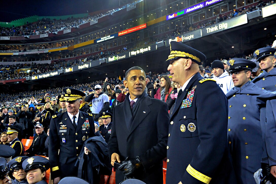 President Barack Obama and Army Chief of Staff Gen. Raymond T. Odierno watch the action during the Army-Navy football game  at FedEx Field in Landover, Md., Dec. 10, 2011.