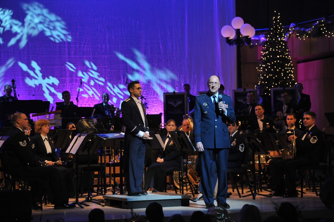 OMAHA, Neb. - Gen. C. Robert Kehler, commander, U.S. Strategic Command, addresses concert goers during the Heartland of America Band's holiday "Silver and Gold" concert performance Dec. 11 at the Holland Center for the Performing Arts.