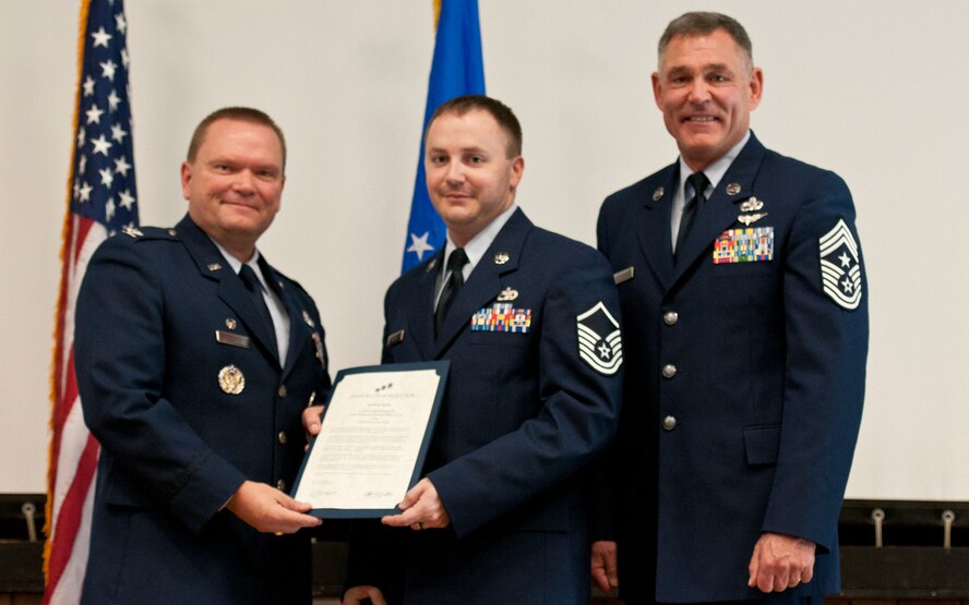 JOINT BASE ANDREWS, Md. -- The 459th Air Refueling Wing held its third Non-comissioned officer and Senior Non-commissioned officer induction ceremony of 2011 in the Wing Auditorium here, Dec. 4, 2011. The induction ceremonies are sponsored by the wing's Top 3 organization and are held at multiple times throughout the year for Airmen who have made the NCO and SNCO ranks. (U.S. Air Force photo/Tech. Sgt. Steve Lewis)