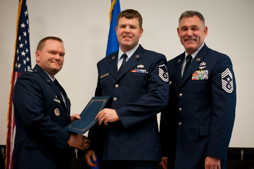 JOINT BASE ANDREWS, Md. -- The 459th Air Refueling Wing held its third Non-comissioned officer and Senior Non-commissioned officer induction ceremony of 2011 in the Wing Auditorium here, Dec. 4, 2011. The induction ceremonies are sponsored by the wing's Top 3 organization and are held at multiple times throughout the year for Airmen who have made the NCO and SNCO ranks. (U.S. Air Force photo/Tech. Sgt. Steve Lewis)