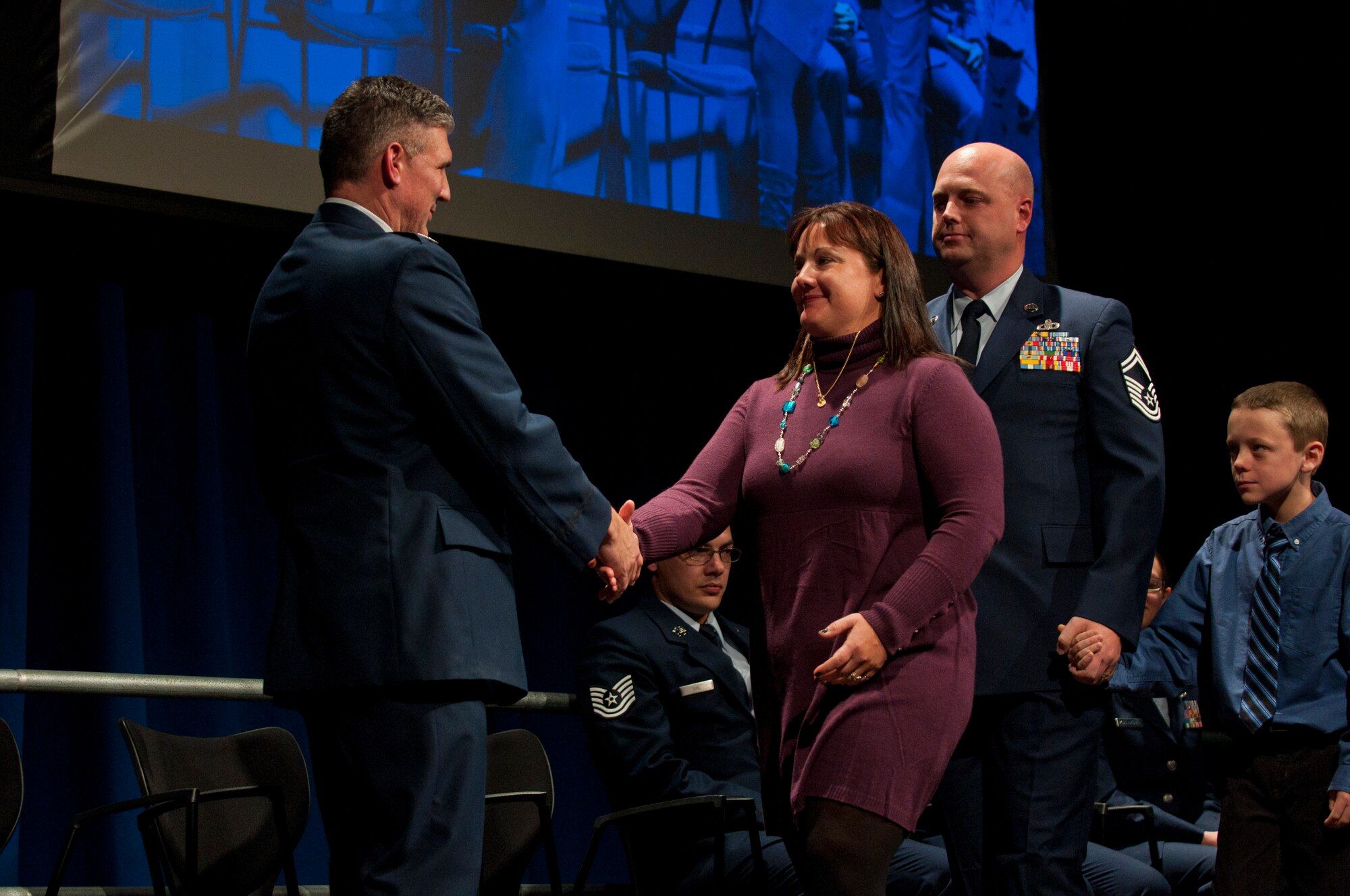 The 133rd Airlift Wing recognized outstanding achievements during the 2011 Recognition Ceremony Dec. 10, 2011, featuring director of the Air National Guard Lt. Gen. Harry M. Wyatt, III. He joined Maj. Gen. Rick Nash, adjutant general of the Minnesota National Guard, and Col. Greg Haase, commander of the 133rd Airlift Wing in the official party at the Wing awards ceremony. Over 1,000 Airmen, family and friend gathered in the North Hangar at the St. Paul Air National Guard base to celebrate the Outstanding Airmen of the Year and other award winners from the past twelve months. U.S. Air Force photo by Staff Sgt. Austen Adriaens (released)