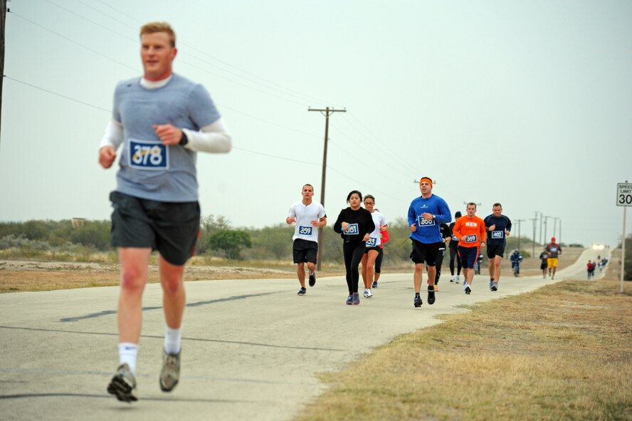 LAUGHLIN AIR FORCE BASE, Texas – A group of Team XL members participate in the second annual Shooting Star Half Marathon and 5K here Dec. 10. About 100 people took part in the race. (U.S. Air Force photo/Senior Airman Scott Saldukas) 