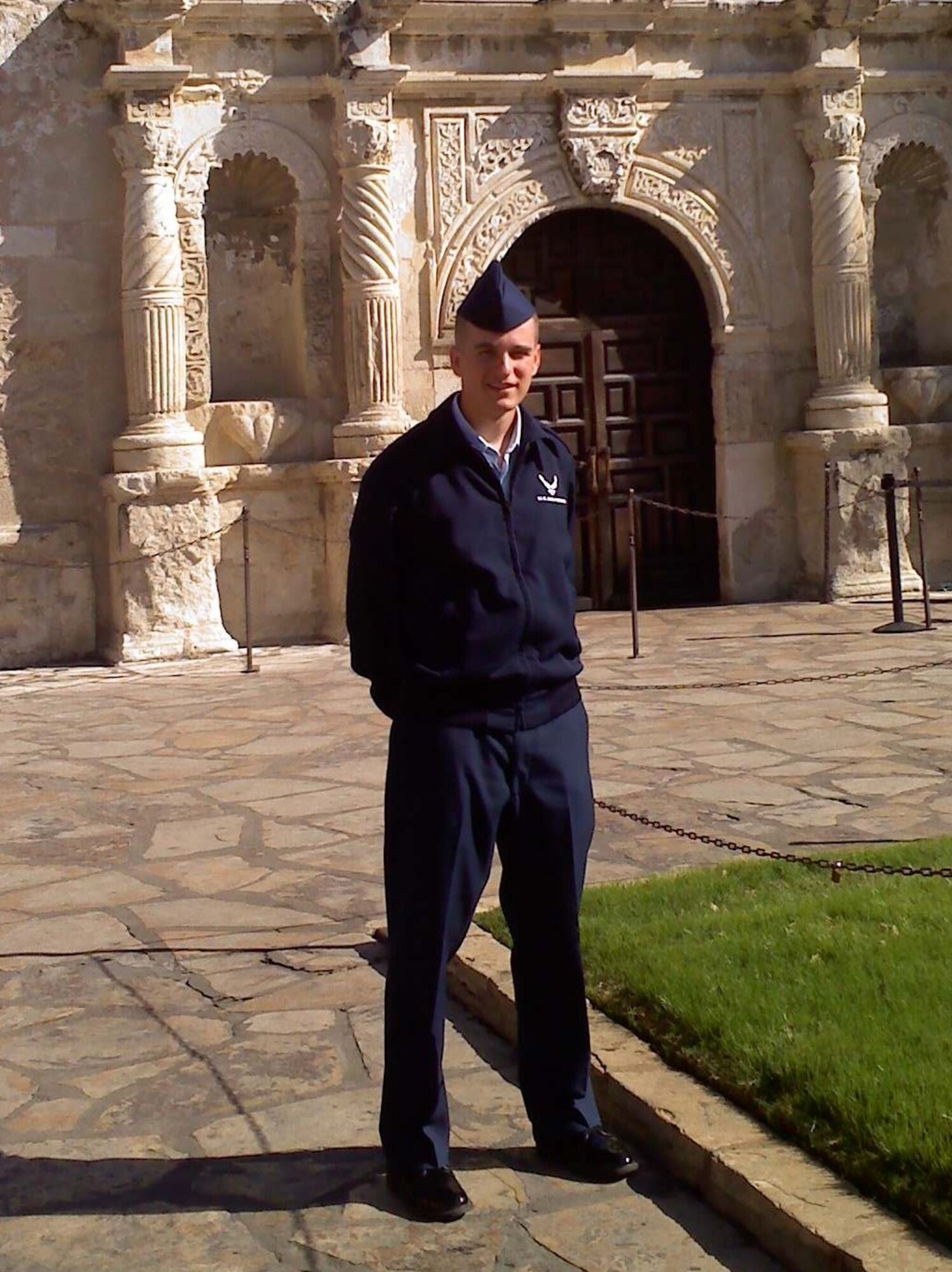 Airman 1st Class John Schmidt stands outside the Alamo after graduating Basic Training from Lackland Air Force Base, TX.  While performing Charge of Quarters door guard duty on November 21, during technical training at Sheppard Air Force Base, Texas, The 914th AES Technician Student  was approached by another Airman who claiming he had a grenade.  Schmidt then took actions to impede the potential bomb threat. 