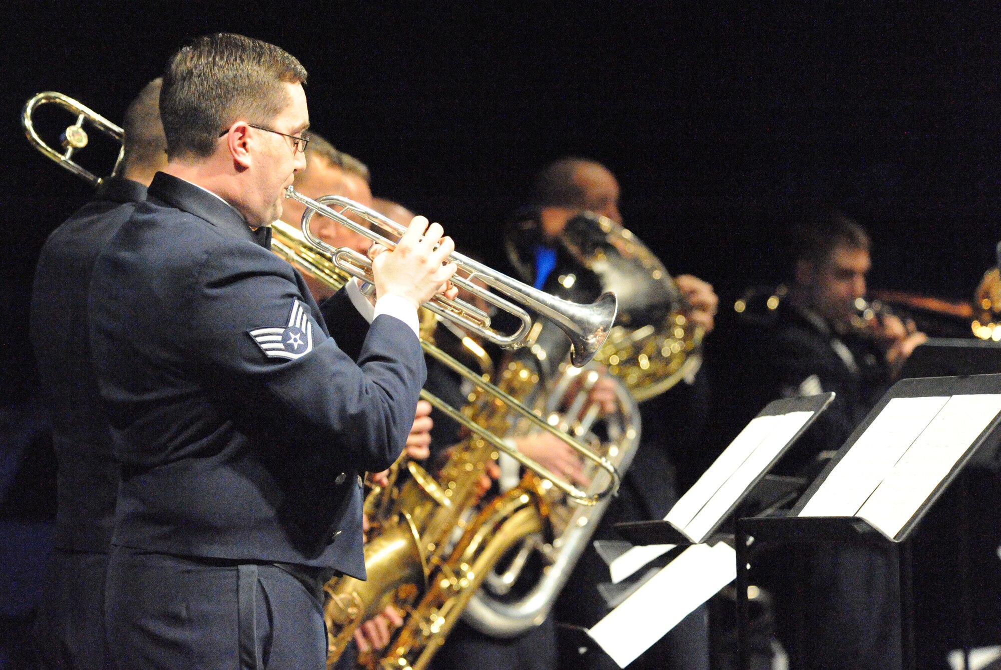 JOINT BASE ELMENDORF-RICHARDSON, Alaska – Members of the Air Force Band of the Pacific perform for a near-capacity crowd at the Alaska Center for the Performing Arts in downtown Anchorage Dec. 6. The show was one of two free concerts done to promote relations between Joint Base Elmendorf-Richardson and the Anchorage community. (U.S. Air Force photo by Senior Airman Blake Mize)