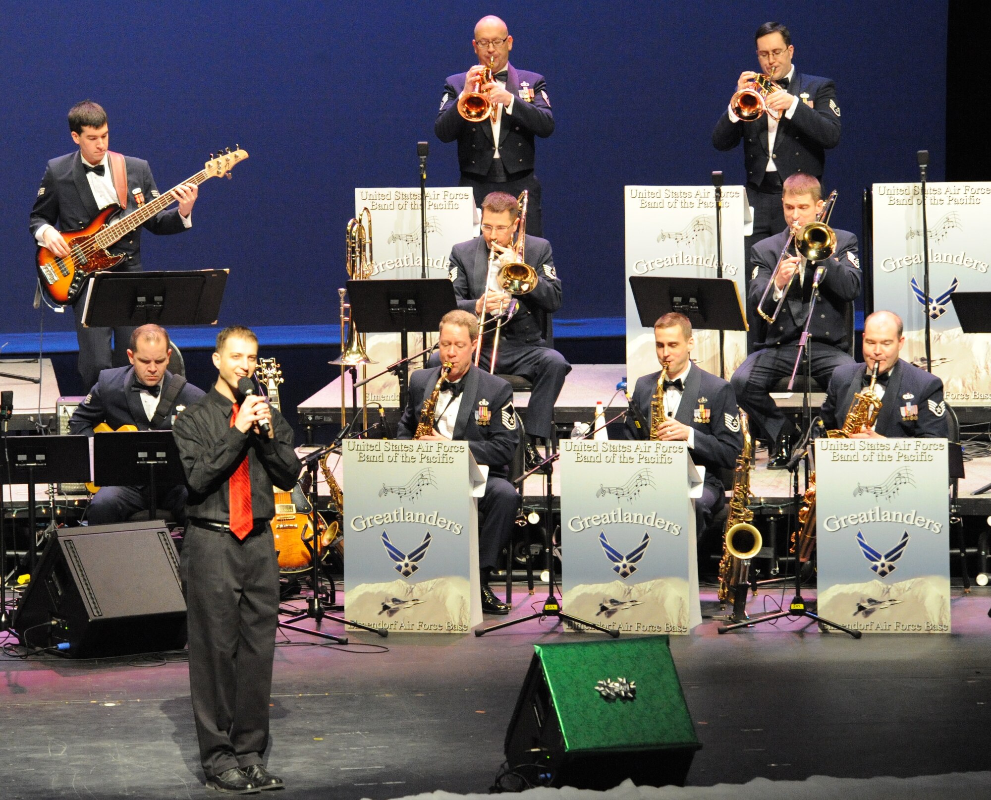 JOINT BASE ELMENDORF-RICHARDSON, Alaska – Members of the Air Force Band of the Pacific perform for a near-capacity crowd at the Alaska Center for the Performing Arts in downtown Anchorage Dec. 6. The show was one of two free concerts done to promote relations between Joint Base Elmendorf-Richardson and the Anchorage community. (U.S. Air Force photo by Senior Airman Blake Mize)