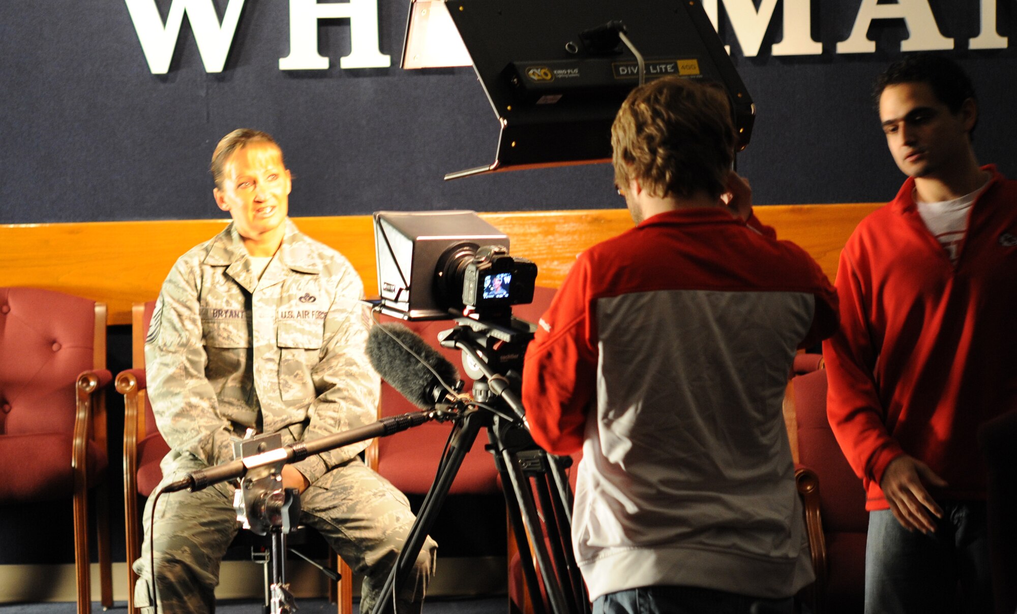 Senior Master Sgt. (First Sgt.) Angela Bryant, 442nd Security Forces Squadron first sergeant, answers questions about her military service and her history as a dedicated Kansas City Chiefs fan, Dec. 9, 2011. The KC Chiefs is a National Football League team that is making a web episode about the 442nd Fighter Wing for their internet-based show, Chiefs Kingdom. The 442nd Fighter Wing is an A-10 Thunderbolt II Air Force Reserve unit at Whiteman Air Force Base, Mo. (U.S. Air Force photo/Staff Sgt. Danielle Wolf)