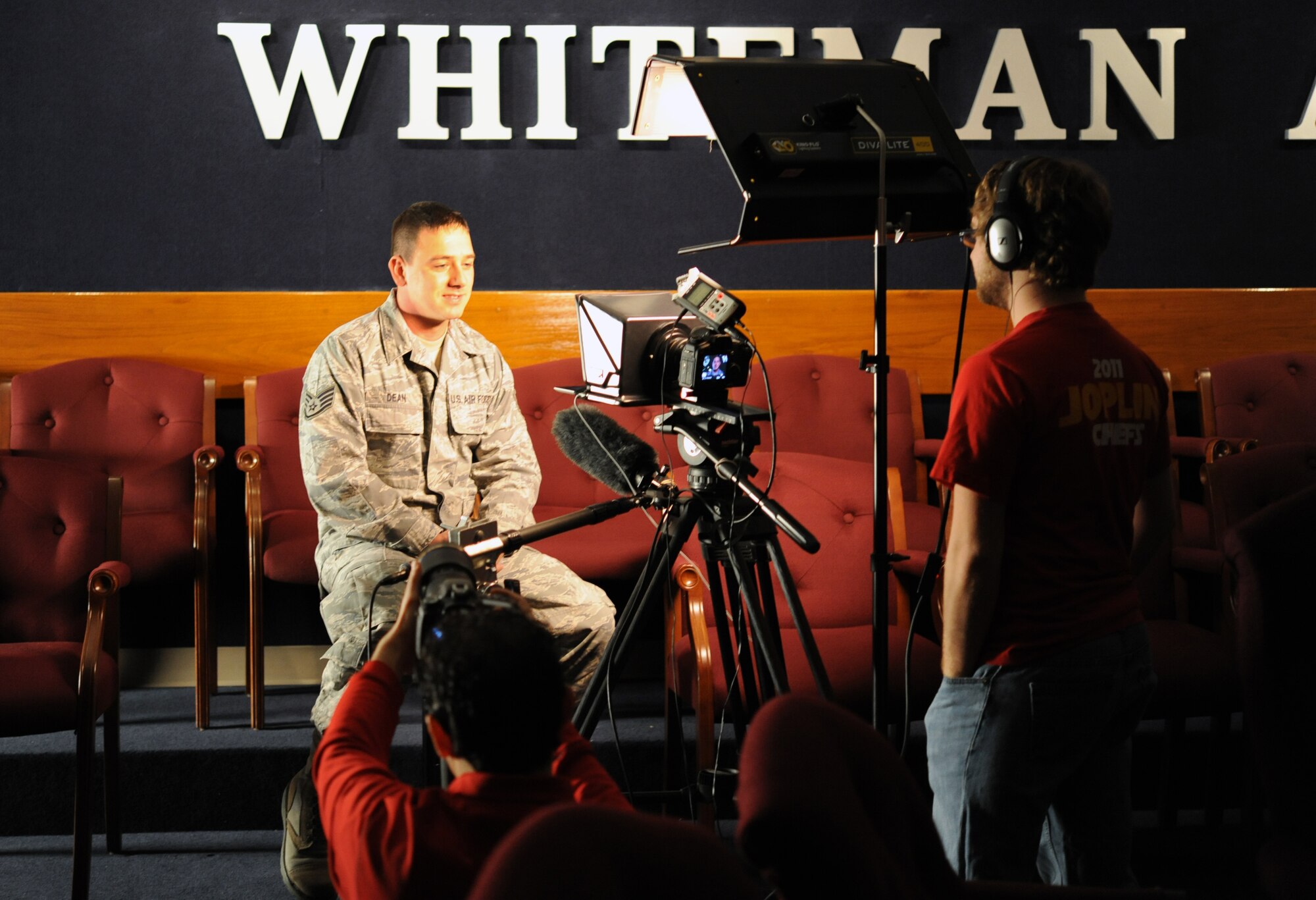 Staff Sgt. Rick Dean, 442nd Aircraft Maintenance Squadron electro-environmental technician, answers questions about his military service and his history as a dedicated Kansas City Chiefs fan, Dec. 9, 2011. The KC Chiefs is a National Football League team that is making a web episode about the 442nd Fighter Wing for their internet-based show, Chiefs Kingdom. The 442nd Fighter Wing is an A-10 Thunderbolt II Air Force Reserve unit at Whiteman Air Force Base, Mo. (U.S. Air Force photo/Staff Sgt. Danielle Wolf)