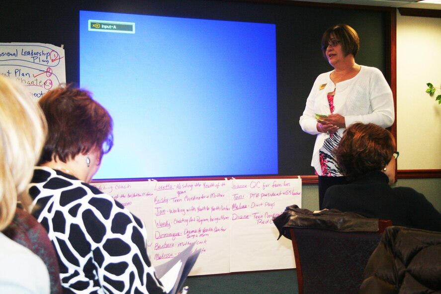 Debbie Stewart, youth coordinator from Scott Air Force Base, Ill., gives a presentation during advanced leadership training at Headquarters Air Mobility Command at Scott AFB on Dec. 8, 2011. The training, led by AMC Headquarters with the Boys and Girls Clubs of America, was designed to "help youth and teen centers to move their programs from just being good to being great." The training, officials say, also falls in line with AMC's Comprehensive Airman Fitness culture of helping Airmen, Air Force civilians and family members become more resilient and better-equipped to deal with the rigors of military life. (U.S. Air Force Photo/Master Sgt. Scott T. Sturkol)