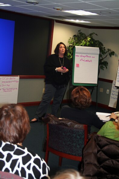 Toni Johnson, youth coordinator from Scott Air Force Base, Ill., gives a presentation during advanced leadership training at Headquarters Air Mobility Command at Scott AFB on Dec. 8, 2011. The training, led by AMC Headquarters with the Boys and Girls Clubs of America, was designed to "help youth and teen centers to move their programs from just being good to being great." The training, officials say, also falls in line with AMC's Comprehensive Airman Fitness culture of helping Airmen, Air Force civilians and family members become more resilient and better-equipped to deal with the rigors of military life. (U.S. Air Force Photo/Master Sgt. Scott T. Sturkol)