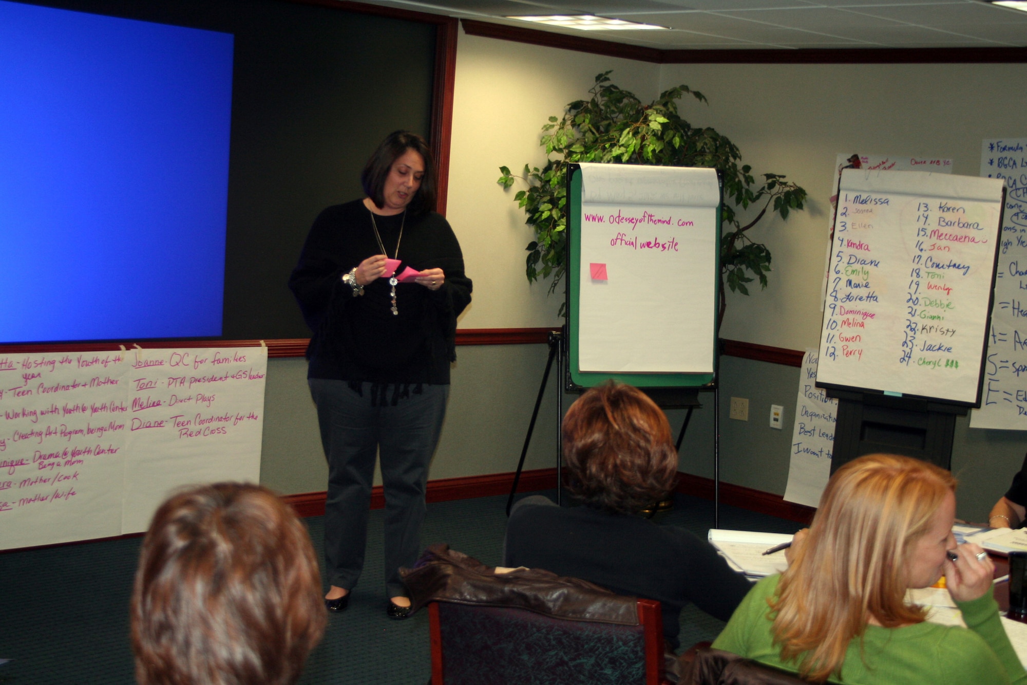 Toni Johnson, youth coordinator from Scott Air Force Base, Ill., gives a presentation during advanced leadership training at Headquarters Air Mobility Command at Scott AFB on Dec. 8, 2011. The training, led by AMC Headquarters with the Boys and Girls Clubs of America, was designed to "help youth and teen centers to move their programs from just being good to being great." The training, officials say, also falls in line with AMC's Comprehensive Airman Fitness culture of helping Airmen, Air Force civilians and family members become more resilient and better-equipped to deal with the rigors of military life. (U.S. Air Force Photo/Master Sgt. Scott T. Sturkol)
