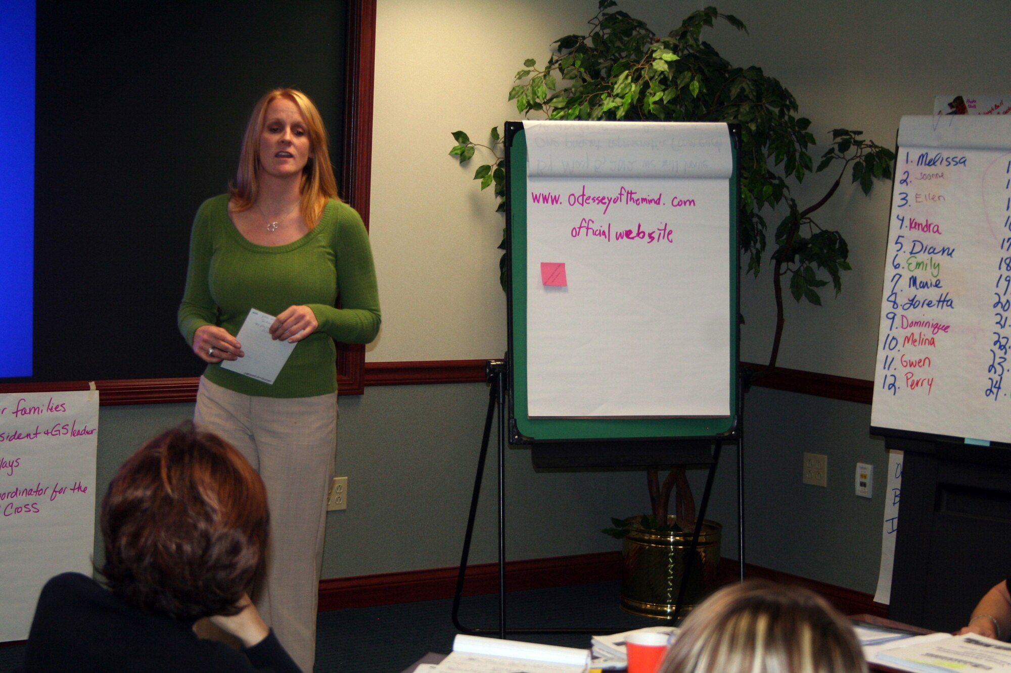 Courtney Johnson, youth coordinator from McConnell Air Force Base, Kan., gives a presentation during advanced leadership training at Headquarters Air Mobility Command at Scott AFB, Ill., on Dec. 8, 2011. The training, led by AMC Headquarters with the Boys and Girls Clubs of America, was designed to "help youth and teen centers to move their programs from just being good to being great." The training, officials say, also falls in line with AMC's Comprehensive Airman Fitness culture of helping Airmen, Air Force civilians and family members become more resilient and better-equipped to deal with the rigors of military life. (U.S. Air Force Photo/Master Sgt. Scott T. Sturkol)