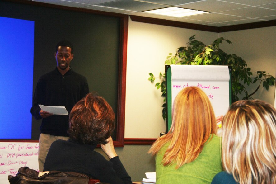 Perry Huff, youth coordinator from Scott Air Force Base, Ill., gives a presentation during advanced leadership training at Headquarters Air Mobility Command at Scott AFB on Dec. 8, 2011. The training, led by AMC Headquarters with the Boys and Girls Clubs of America, was designed to "help youth and teen centers to move their programs from just being good to being great." The training, officials say, also falls in line with AMC's Comprehensive Airman Fitness culture of helping Airmen, Air Force civilians and family members become more resilient and better-equipped to deal with the rigors of military life. (U.S. Air Force Photo/Master Sgt. Scott T. Sturkol)
