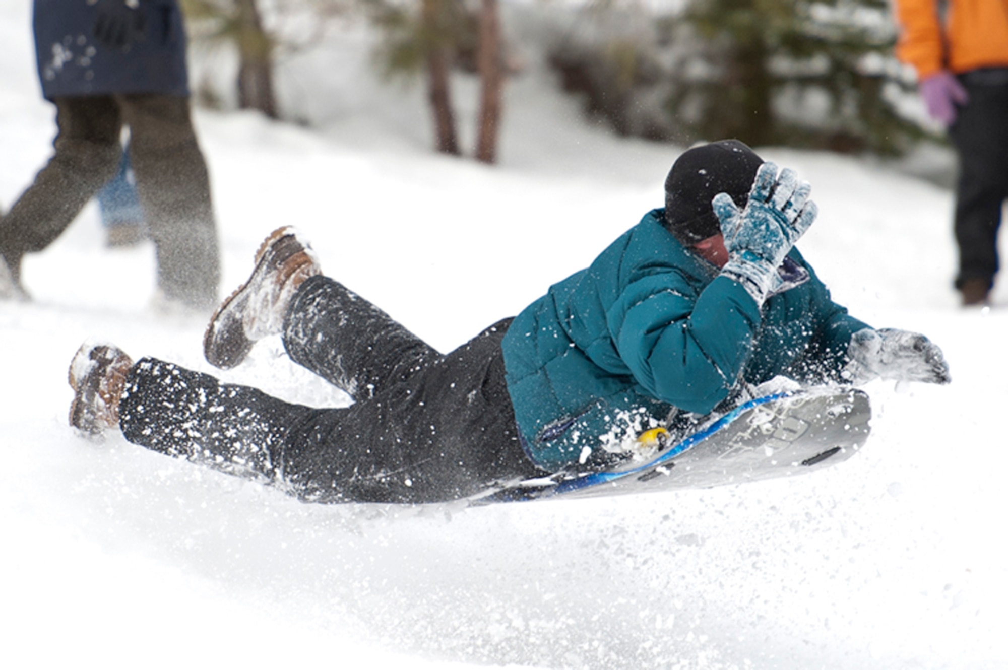 ALTERNATE ENDINGS: Sledding headfirst increases the risk of head and neck injuries and should be avoided. (Photo by Tech. Sgt. Samuel Bendet)