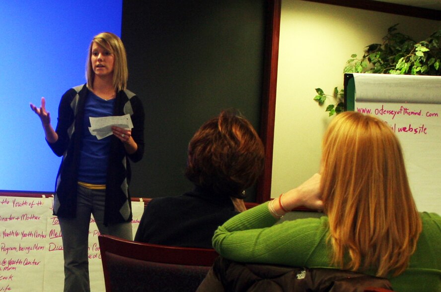 Ellen Koerting, youth coordinator from Grand Forks Air Force Base, N.D., gives a presentation during advanced leadership training at Headquarters Air Mobility Command at Scott Air Force Base, Ill., on Dec. 8, 2011. The training, led by AMC Headquarters with the Boys and Girls Clubs of America, was designed to "help youth and teen centers to move their programs from just being good to being great." The training, officials say, also falls in line with AMC's Comprehensive Airman Fitness culture of helping Airmen, Air Force civilians and family members become more resilient and better-equipped to deal with the rigors of military life. (U.S. Air Force Photo/Master Sgt. Scott T. Sturkol)