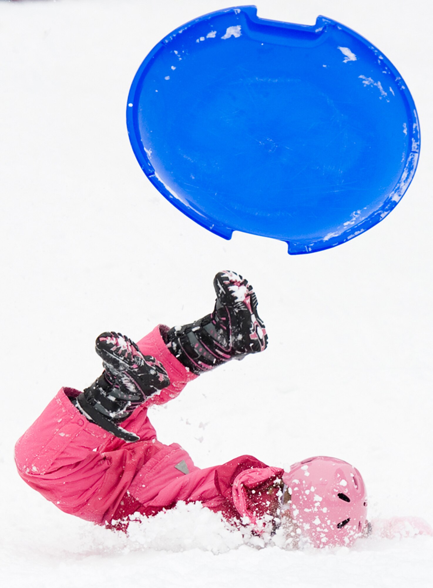 ALTERNATE ENDINGS: Sliding downhill is an exhilarating winter sport. People of all ages can participate, and use all kinds of containers, from large toboggans to plastic disks or even cardboard boxes. But accidental injuries from sledding are surprisingly common despite snow’s cushioning effect. The National Safety Council offers these guidelines for safe and fun sledding and tobogganing. (Photo by Tech. Sgt. Samuel Bendet)