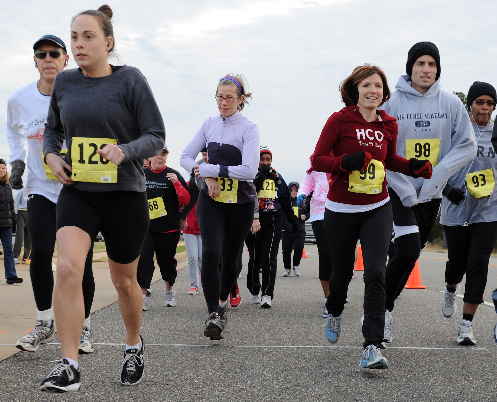 Runners participate in the second annual “Race ‘Round the Base” at Langley Air Force Base, Va., Dec. 10, 2011. More than 150 runners participated in the event, and had the option of completing a 5-kilometer or a 10-mile route around the base. (U.S. Air Force photo by Airman 1st Class Teresa Cleveland/Released) 