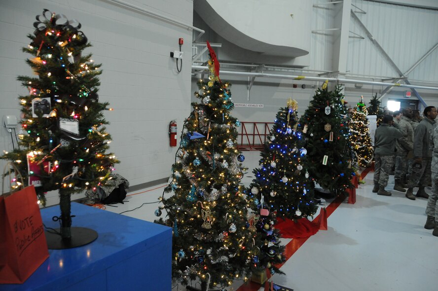 Squadrons from the 916th Air Refueling Wing decorated trees in order to raise money for Airmen in need this holiday season. Trees were presented on Dec. 11, 2011 and donations were taken to select the winner. (USAF photo by Tech. Sgt. Scotty Sweatt, 916ARW/PA)