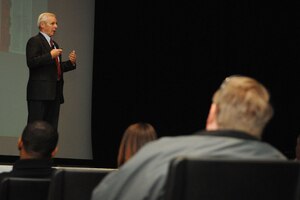 Timothy Thomas, Foreign Military Studies senior analyst, Fort Leavenworth, Kan., discusses information warfare and operations at Jacobs Theater Dec. 1 at Fort Eustis. Thomas spoke about the ongoing fight for cyber superiority and how countries such as China and Russia attempt to monitor the military strategies and operations of the United States via cyberspace. (U.S. Air Force photo by Staff Sgt. Jeff Nevison/Released)