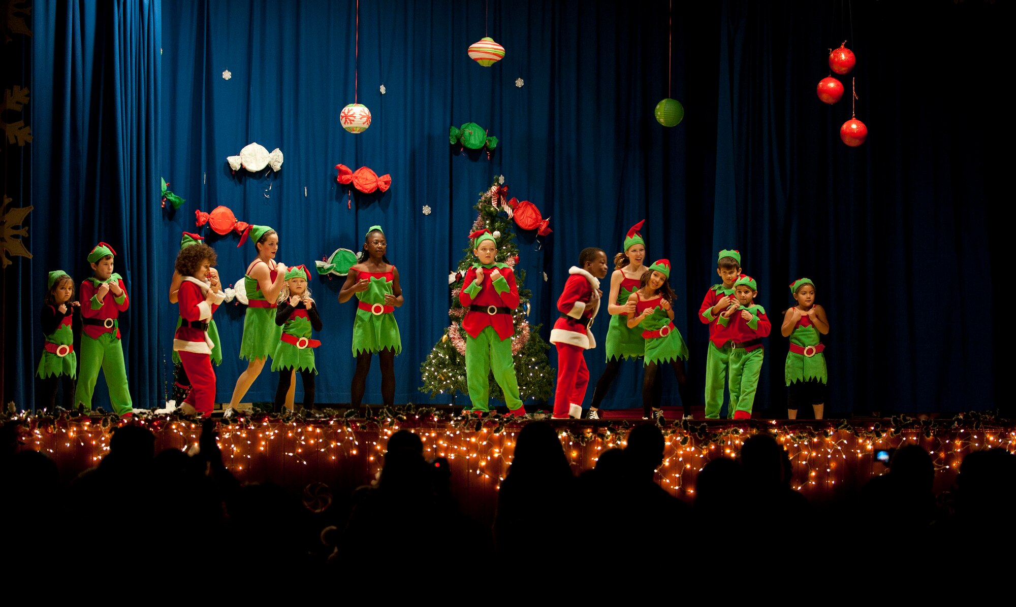 Members of the Youth Dance Program perform during the Nutcracker "Sweet" Dance Show Dec. 10, 2011, in the Incirlik Unit School cafeteria at Incirlik Air Base, Turkey. The performers put on two shows and danced to classical Christmas music along with holiday jazz and hip-hop. (U.S. Air Force photo by Senior Airman Clayton Lenhardt/Released) 