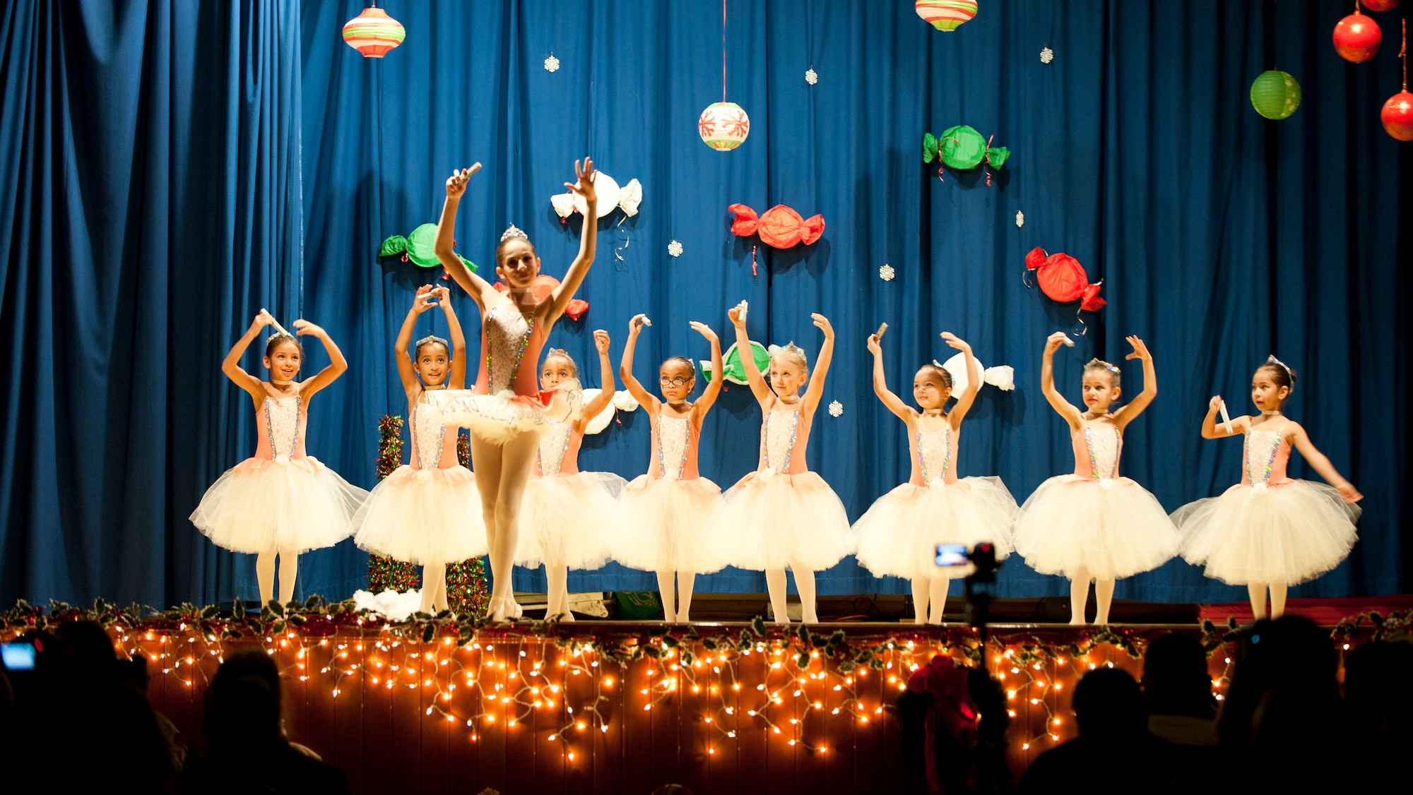 Members of the Youth Dance Program perform during the Nutcracker "Sweet" Dance Show Dec. 10, 2011, in the Incirlik Unit School cafeteria at Incirlik Air Base, Turkey. The performers put on two shows and danced to classical Christmas music along with holiday jazz and hip-hop. (U.S. Air Force photo by Senior Airman Clayton Lenhardt/Released) 