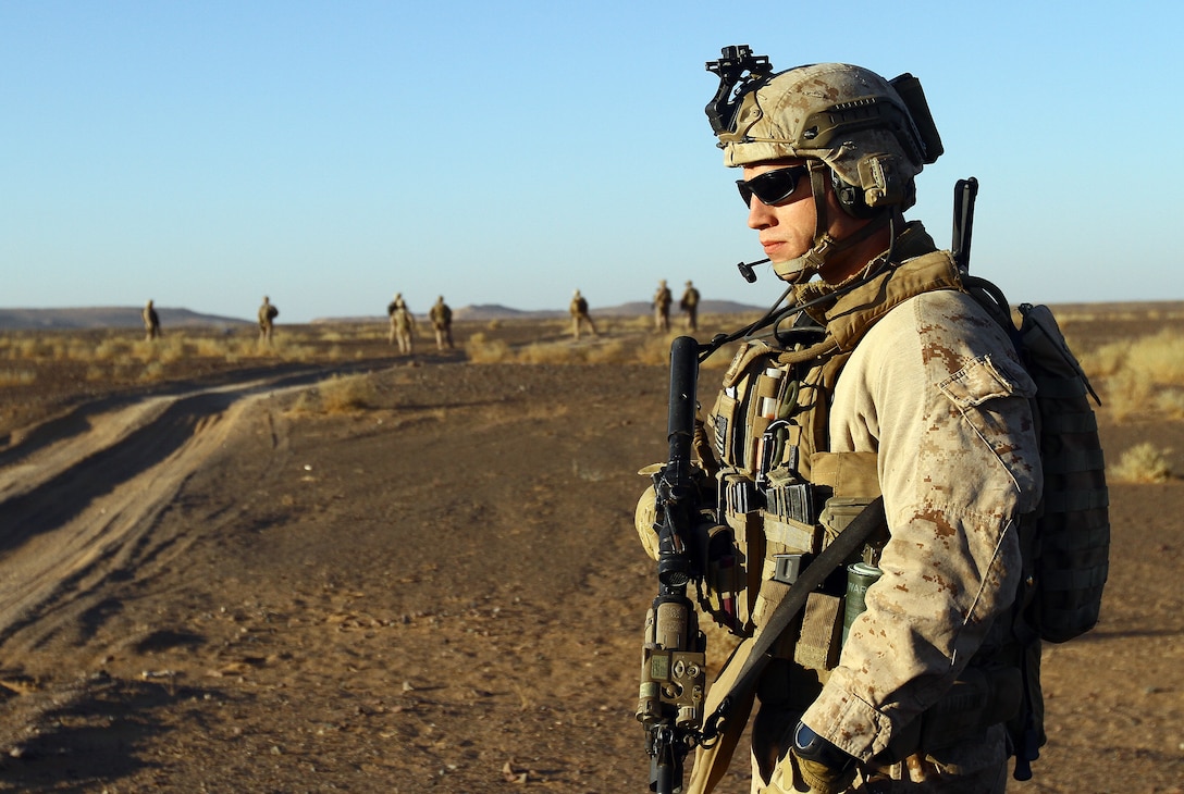 U.S. Marine Capt. Stephen Bartoszak, Charlie Company, 1/25 executive officer and 27-year-old native of Centereach, N.Y., posts security during an air interdiction force mission here, Dec. 7. The AIF mission was conducted in support of an Afghan Border Police led clearing operation in Khan-Neshin. During the mission Marines and sailors from Charlie Co., 1/25, and 2nd Bn., 11th Marines, circled above, searching for suspicious vehicles or personnel. The AIF plays a unique role with Regimental Combat Team 5’s counter-insurgency operations in southern Helmand.