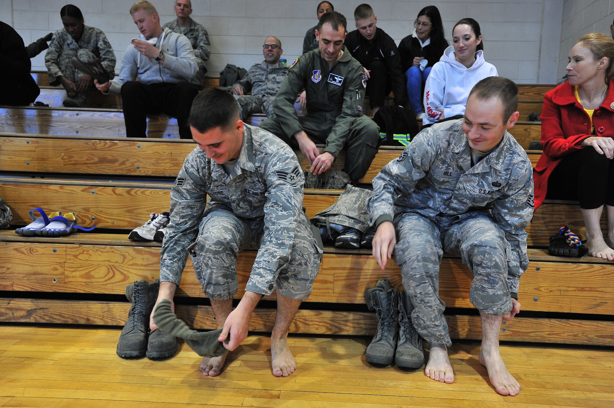 Airmen from the 51st Fighter Wing participate in a one-day lecture and clinic hosted by the Osan Fitness Center Dec. 8, 2011. Ashish Mukharji spoke to approximately 20 Airmen on proper running technique as well as injury prevention. (U.S. Air Force photo/ Daylena Gonzalez)
