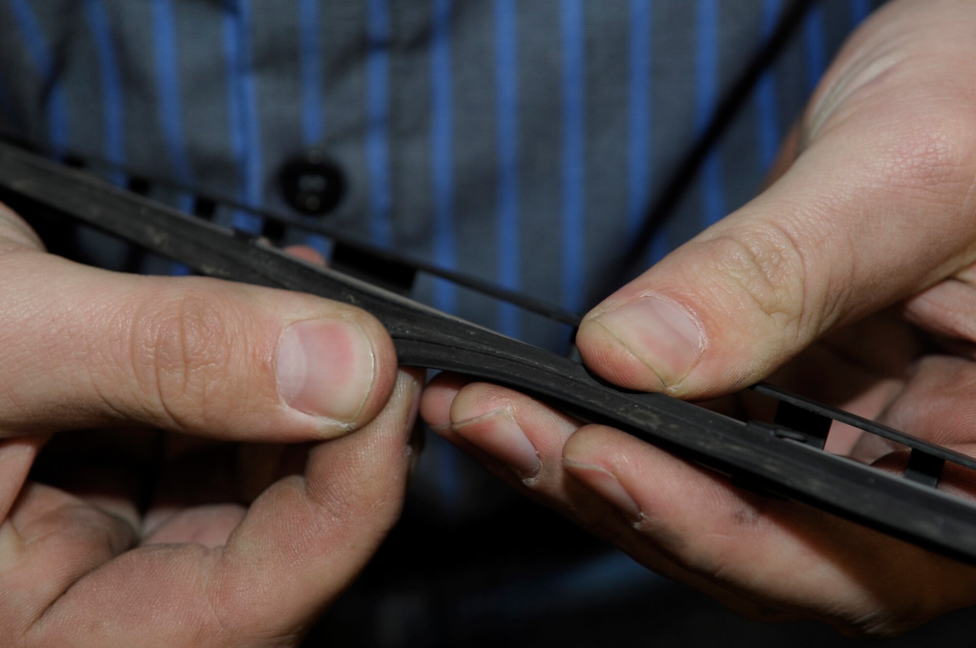 VANDENBERG AIR FORCE BASE, Calif. -- Aaron Moreheart, an automotive specialist, inspects a windshield wiper blade at the auto hobby shop here Friday, Dec. 9, 2011. The auto hobby shop is open to customers with base access offering a variety of services and a knowledgeable staff to help with automotive projects.
(U.S. Air Force photo/Jerry E. Clemens Jr.)
