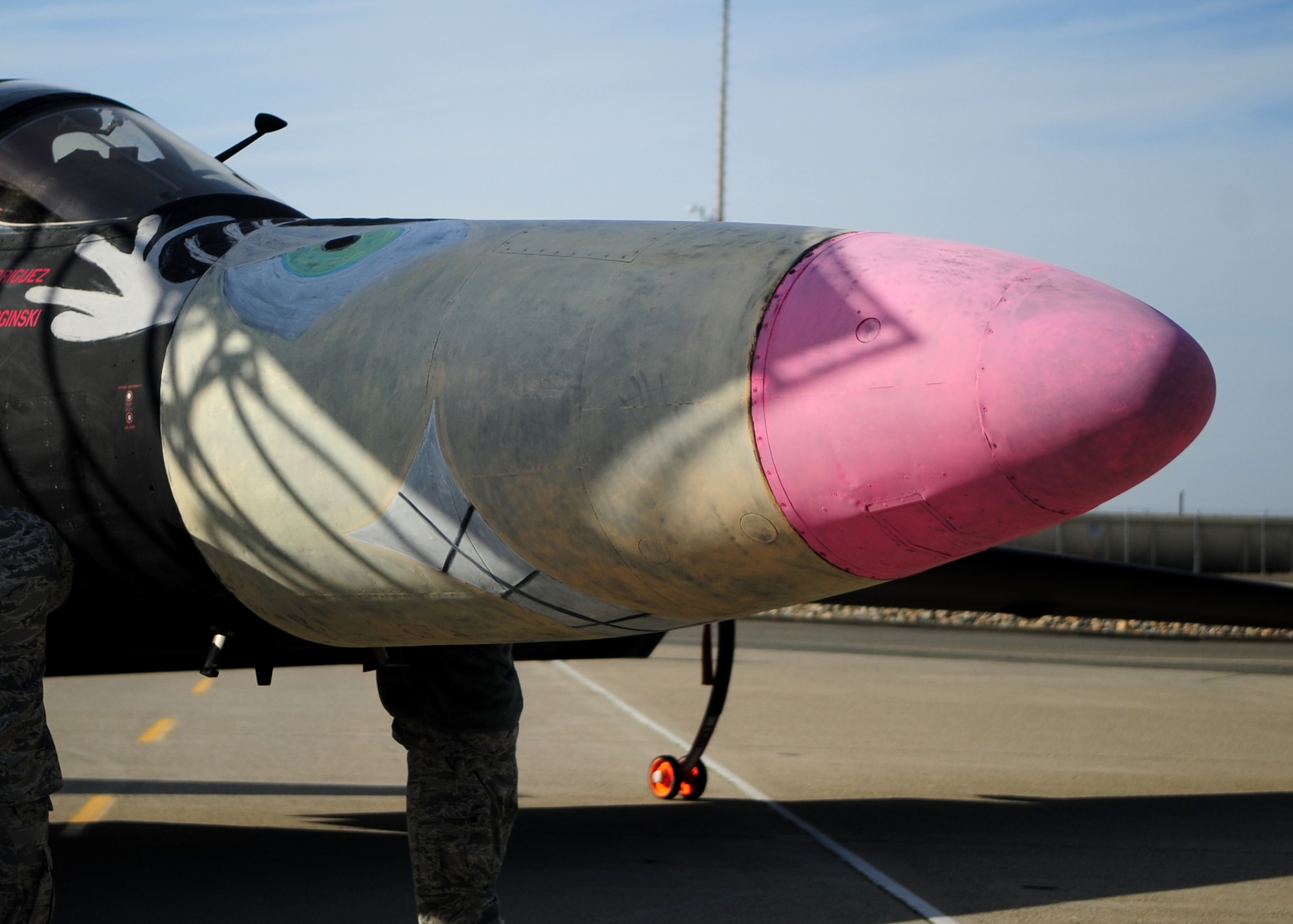 An Air Force U-2 Dragon Lady aircraft, sports nose art portraying Rudolf during the Children's Holiday Party Dec. 10 at Dock 6, Beale AFB, Calif. Santa Claus taxied into Dock 6 to meet more than 1,500 members of Team Beale. (U.S. Air Force photo by Senior Airman Shawn Nickel/Released)