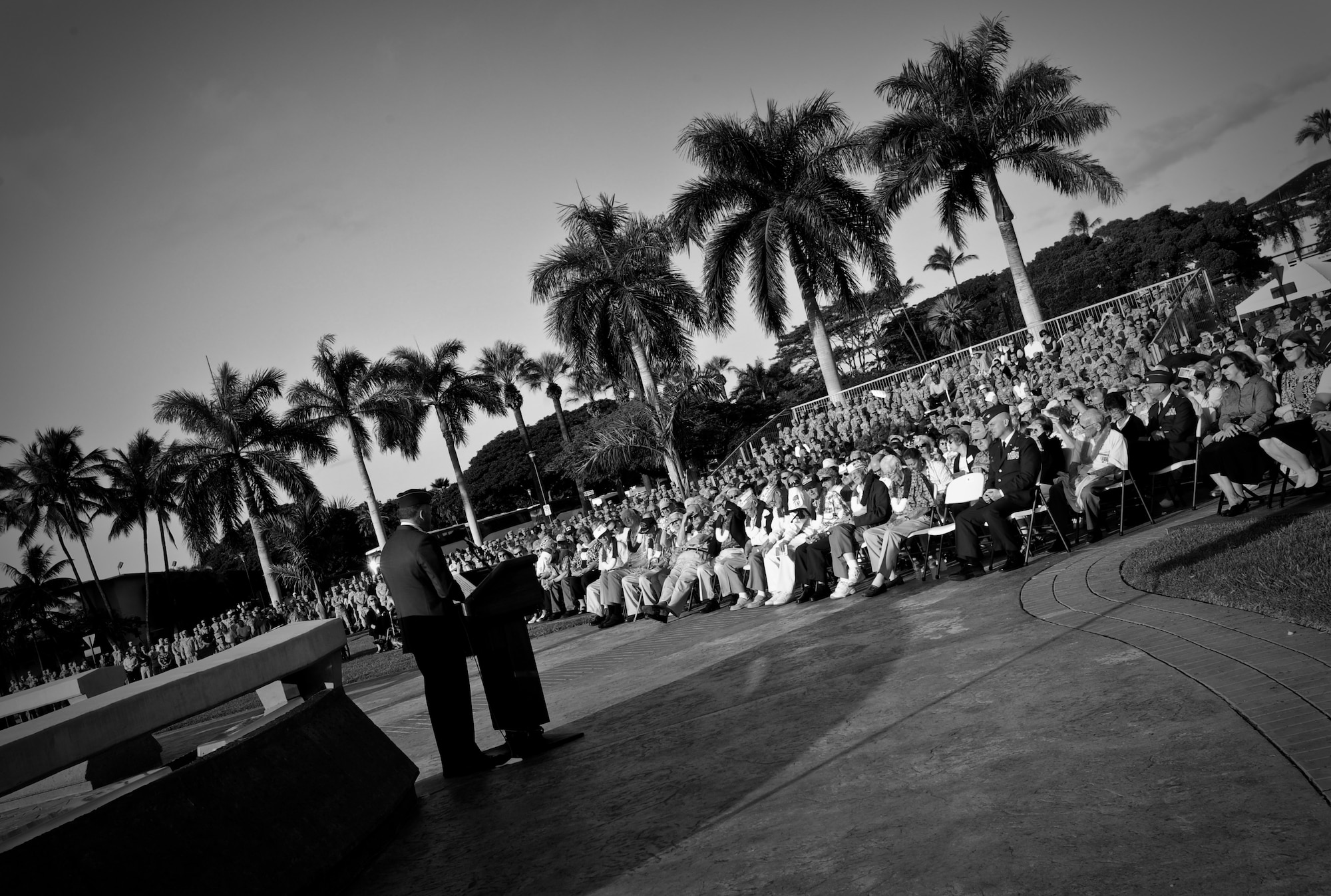 Gen. Gary North, Pacific Air Forces commander, speaks during a Dec. 7, 2011,70th Anniversary Remembrance Ceremony commemorating the 1941 attacks on Hickam Field, now Joint Base Pearl Harbor-Hickam, Hawaii. North spoke of the American resolve and how the Japanese unsuccessfully sought to destroy the American spirit. “While you may have had limited means with which to fight back, they could never destroy your will,” he said. “You leapt from your beds, you manned machine guns on this very field, you struggled to save your aircraft, you grabbed your .45 caliber pistols from your hip and you shot back!”  (U.S. Air Force photo/Senior Airman Lauren Main/Released)