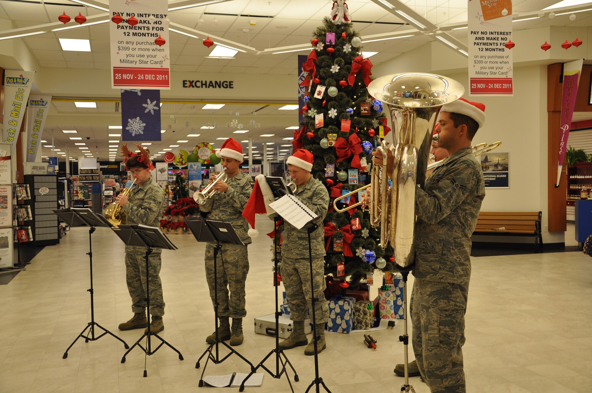 Members of the Air Force Heritage Band play at Joint Base Charleston-Air Base Dec. 9. The  Heritage Band toured JB Charleston to spread holiday cheer by playing traditional Christmas carols. (U.S. Air Force photo/Lt. Leah Davis)