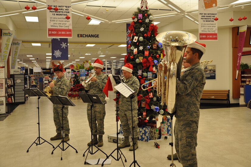 Members of the Air Force Heritage Band play at Joint Base Charleston-Air Base Dec. 9. The  Heritage Band toured JB Charleston to spread holiday cheer by playing traditional Christmas carols. (U.S. Air Force photo/Lt. Leah Davis)