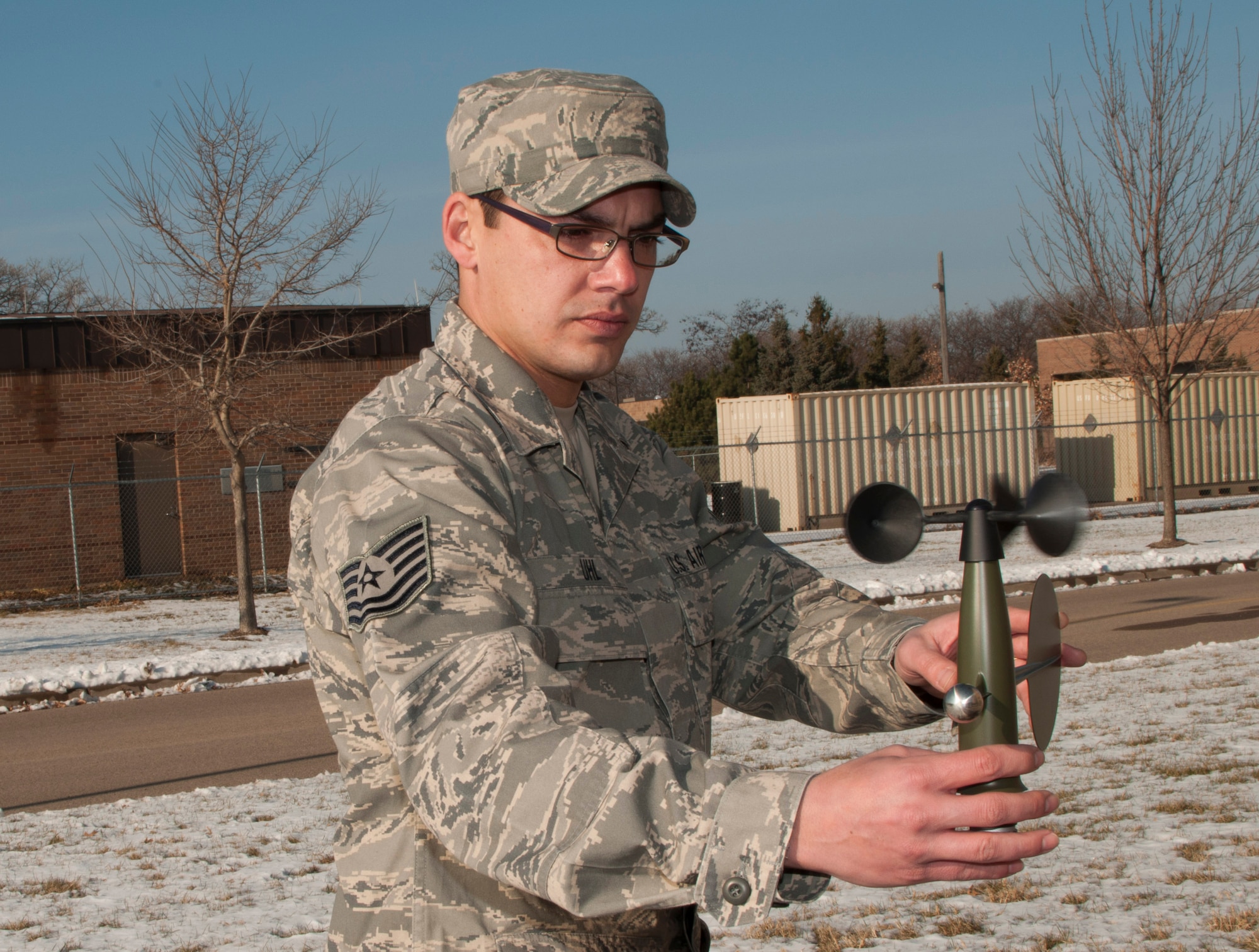 Technical Sergeant Joshua Uhl 208th Weather Flight tests a aneometer used for testing wind speed as part of a tactical weather system during a unit training assembly 133rd Airlift Wing base at the Minneapolis – St. Paul international airport Dec. 10, 2011. U.S. Air Force photo by Tech. Sgt. Erik Gudmundson