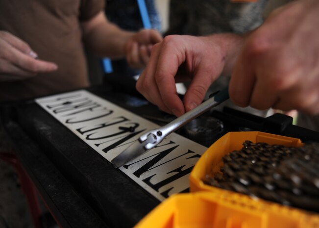 Prisoners spend their days working, cleaning and performing maintenance while confined to the Naval Consolidated Brig Charleston at Joint Base Charleston - Weapons Station Sept. 20. The NAVCONBRIG houses prisoners from each of the Armed forces. (U.S. Air Force photo/Staff Sgt. Katie Gieratz) 
