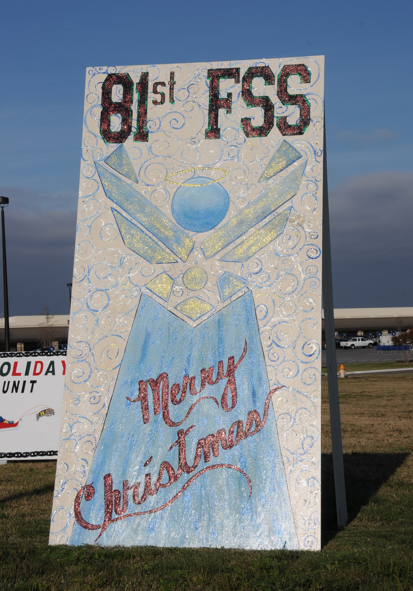 The 81st Force Support Squadron won first place in the most Charismatic category of the Holiday Card contest, Dec. 9, 2011.  The holiday cards are on display on Larcher Blvd. south of the base exchange.  Other winners were the 333rd Training Squadron for most Innovative category and the 81st Contracting Squadron for the most Classic category.  The judging was done by Kimberly Nastasi CEO of Mississippi Gulf Coast Chamber of Commerce and her staff.  Each winning unit will receive 200 Dragon Dollars to offset Holiday parties at the Bay Breeze Event Center or pavilion at Outdoor Recreation, and can also be used at the Bowling Center, Golf Tournaments or other Services activities.  (U.S. Air Force photo by Kemberly Groue)