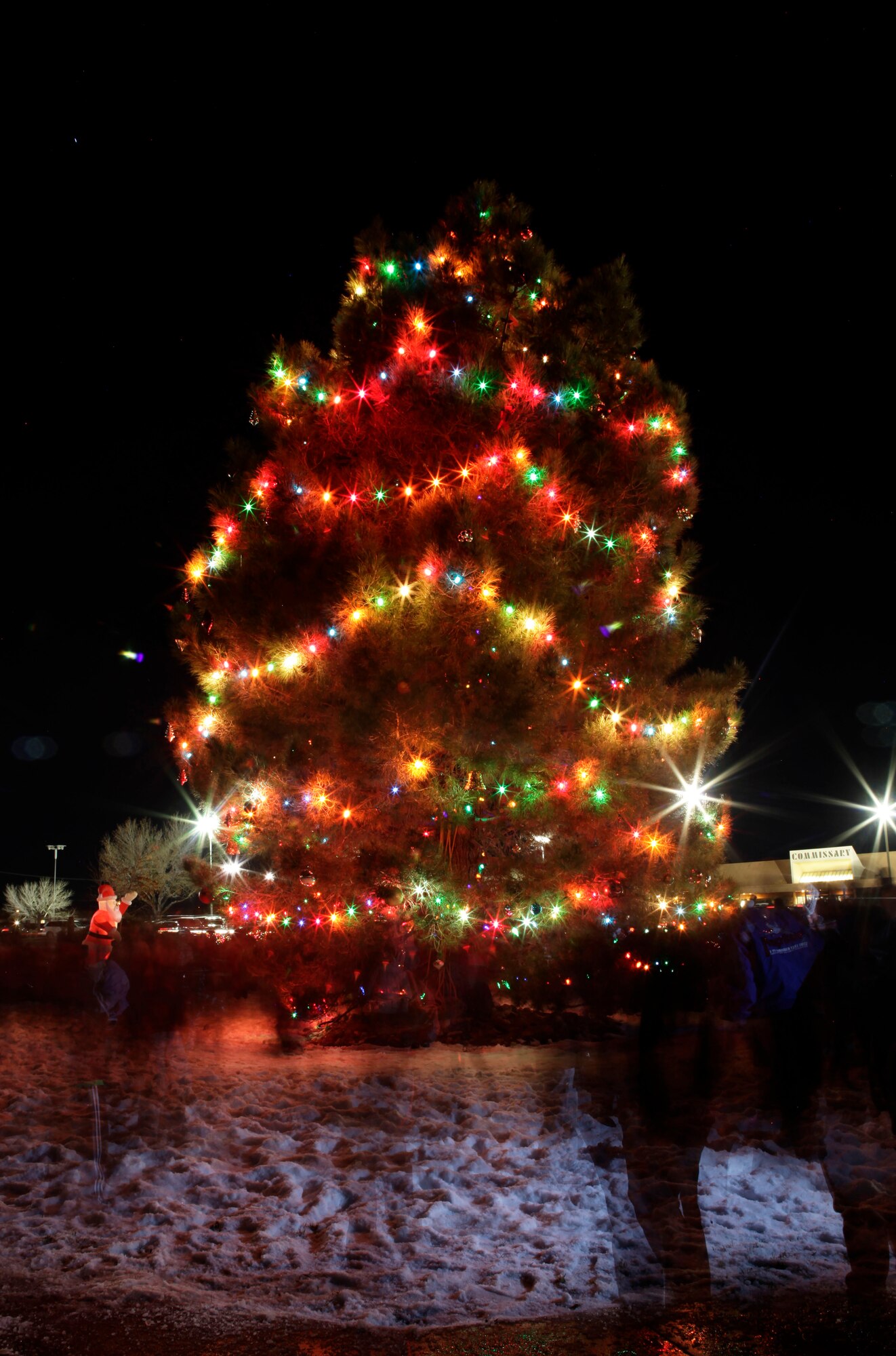 The 95th Force Support Squadron hosted the annual Edwards Tree Lighting Ceremony Dec. 7 here. In keeping with tradition, there was snow to be played in and hot choclate to warm the soul. Members from across the community came out to enjoy the fun. (U.S. Air Force Photo by Chris Neill) 
