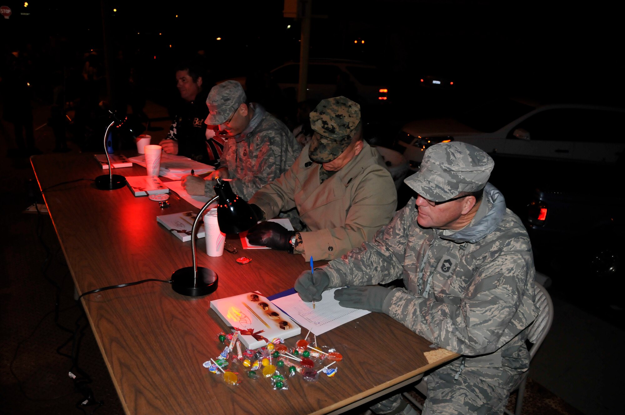 Judging the Boron Christmas Parade was an honor bestowed upon Senior Master Sgt. David Vanvlack, Sgt. Maj. Chalres Dillree, and Chief Master Sgt. Michael Belanger, all from Edwards Air Force Base here. (U.S. Air Force Photo by Chris Neill)  
